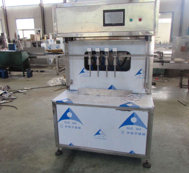 Máy chiết rót 4 đầu tự chảy bán tự động